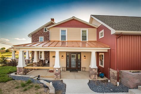 shiny copper metal porch roof on brown house|copper penny metal roof colors.